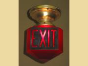 Ruby Red Triangle Exit Sign with Raised Lettering