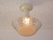 Typical 30s Bedroom Lighting Fixture.  Beige colored bowl on 3 chains from fitter